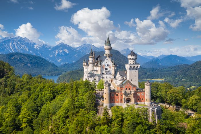 Beautiful view of world-famous Neuschwanstein Castle the romantic 19th century Romanesque Revival palace built for King Ludwig II with scenic mountain landscape in Fussen southwest Bavaria Germany